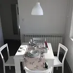 Arenacentar شقة